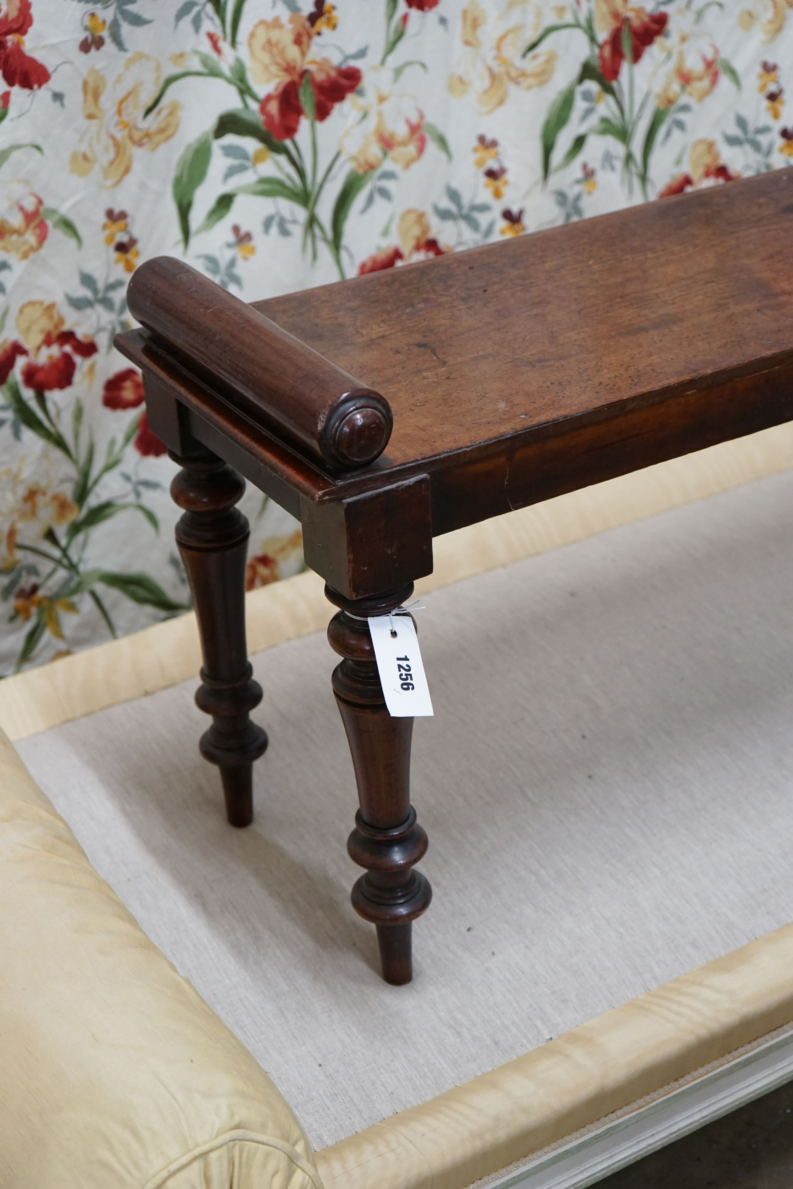 A Victorian mahogany window seat, length 140cm, depth 33cm, height 50cm